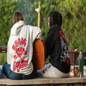 Serigrafía en buzos coordinados - Diseño de pareja estampado Buzos serigrafía blanca con ilustración corazón y texto Rotten Heart